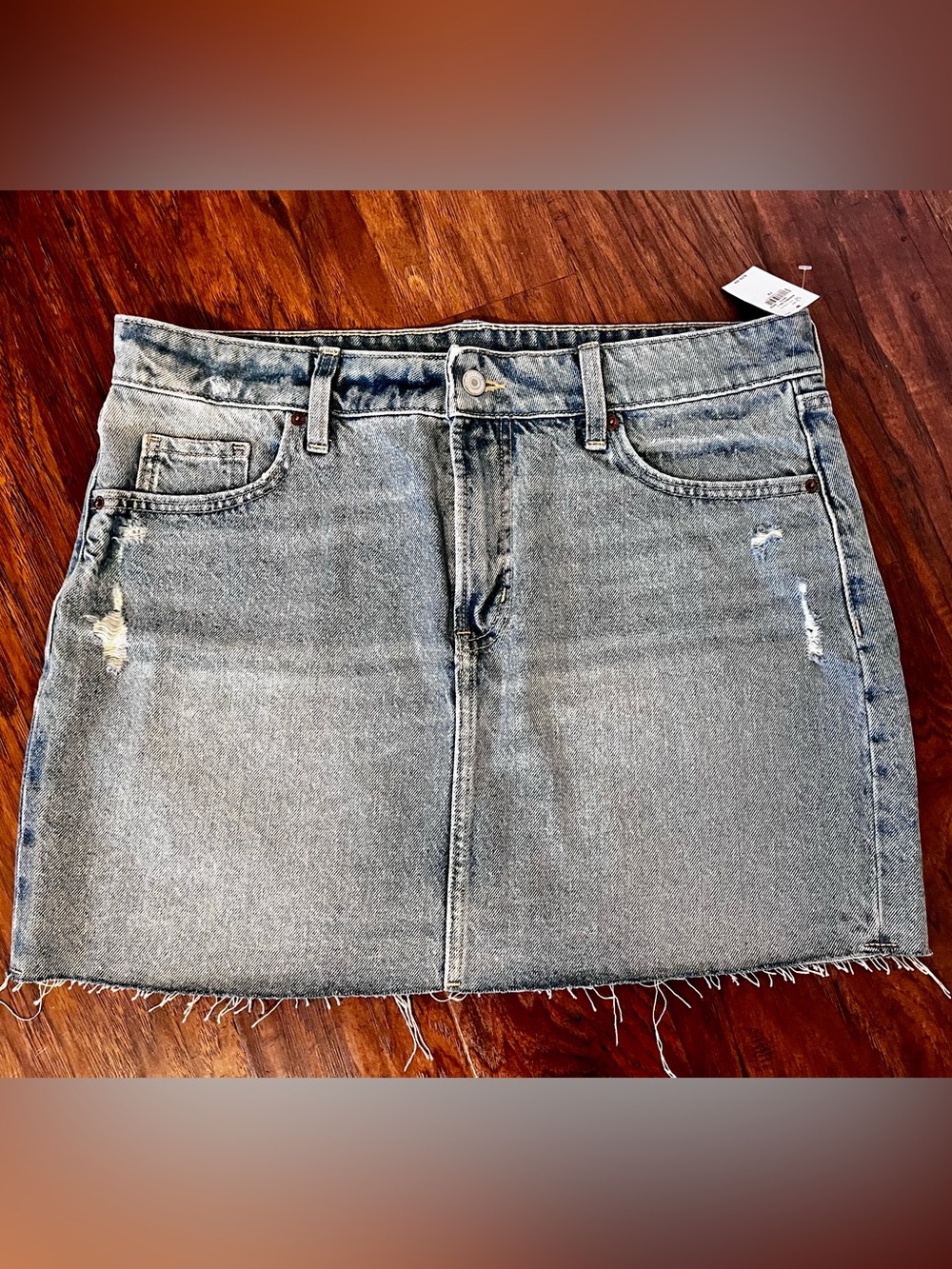 Brand new Light Blue Distressed Denim Mini Skirt. Old Navy size 12